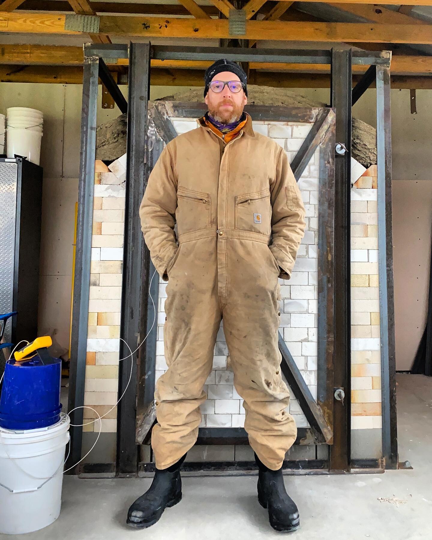 These coveralls are probably about as old as I am, given to me by my dad from his days working as a carpenter. It&rsquo;s cold in Missouri. The firing is going smoothly, will be putting in soda in around noon. 🤘