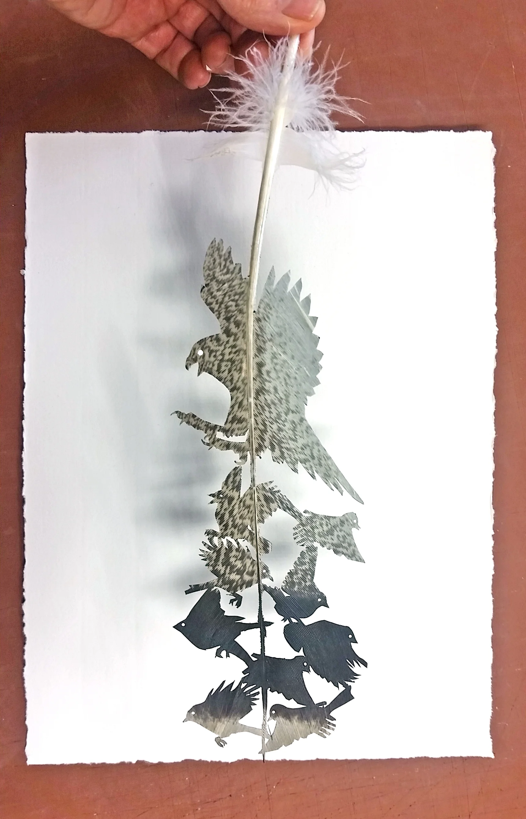 turkey feather carving in process