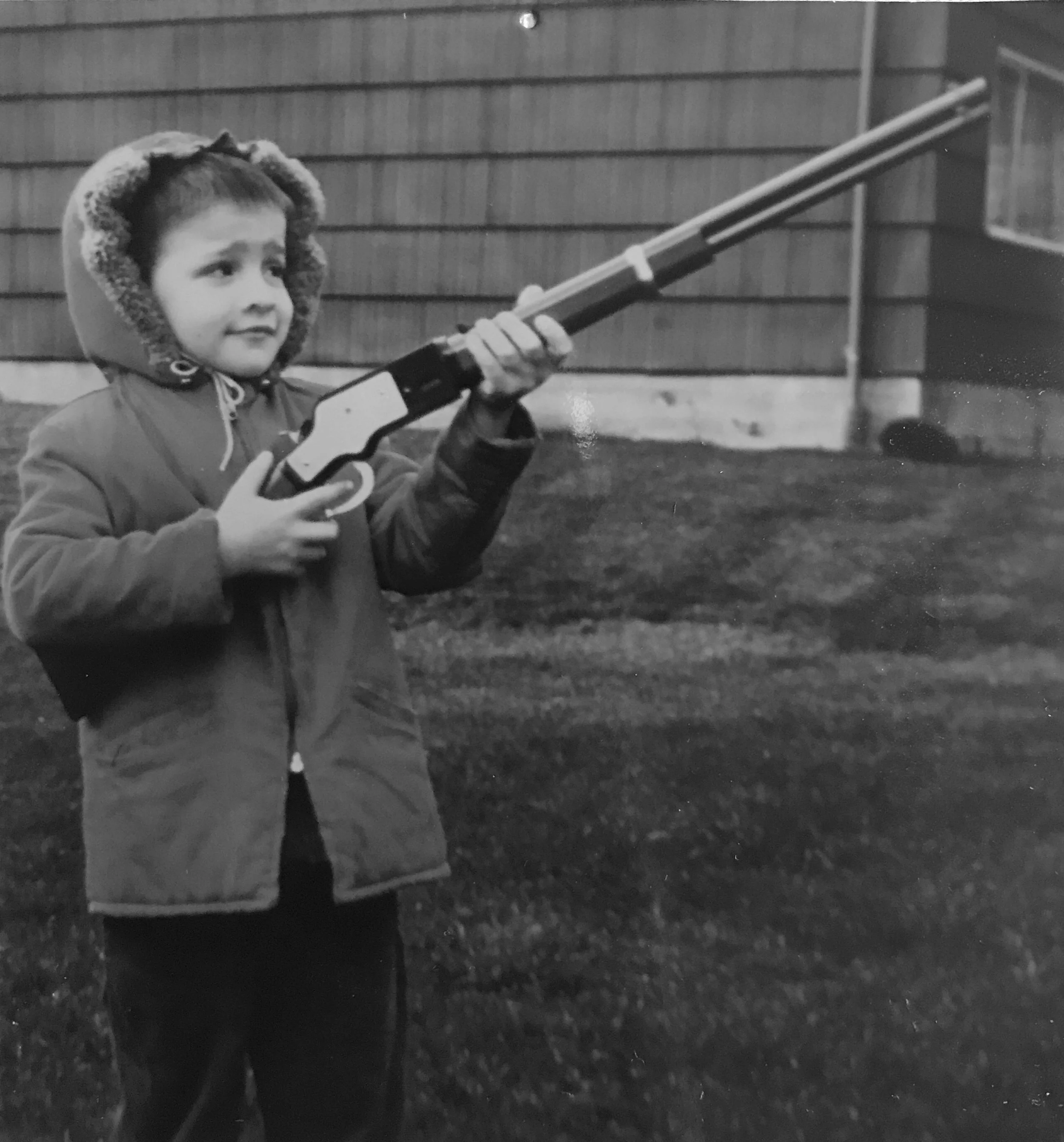 YOUNG VIC WITH GUN.JPG