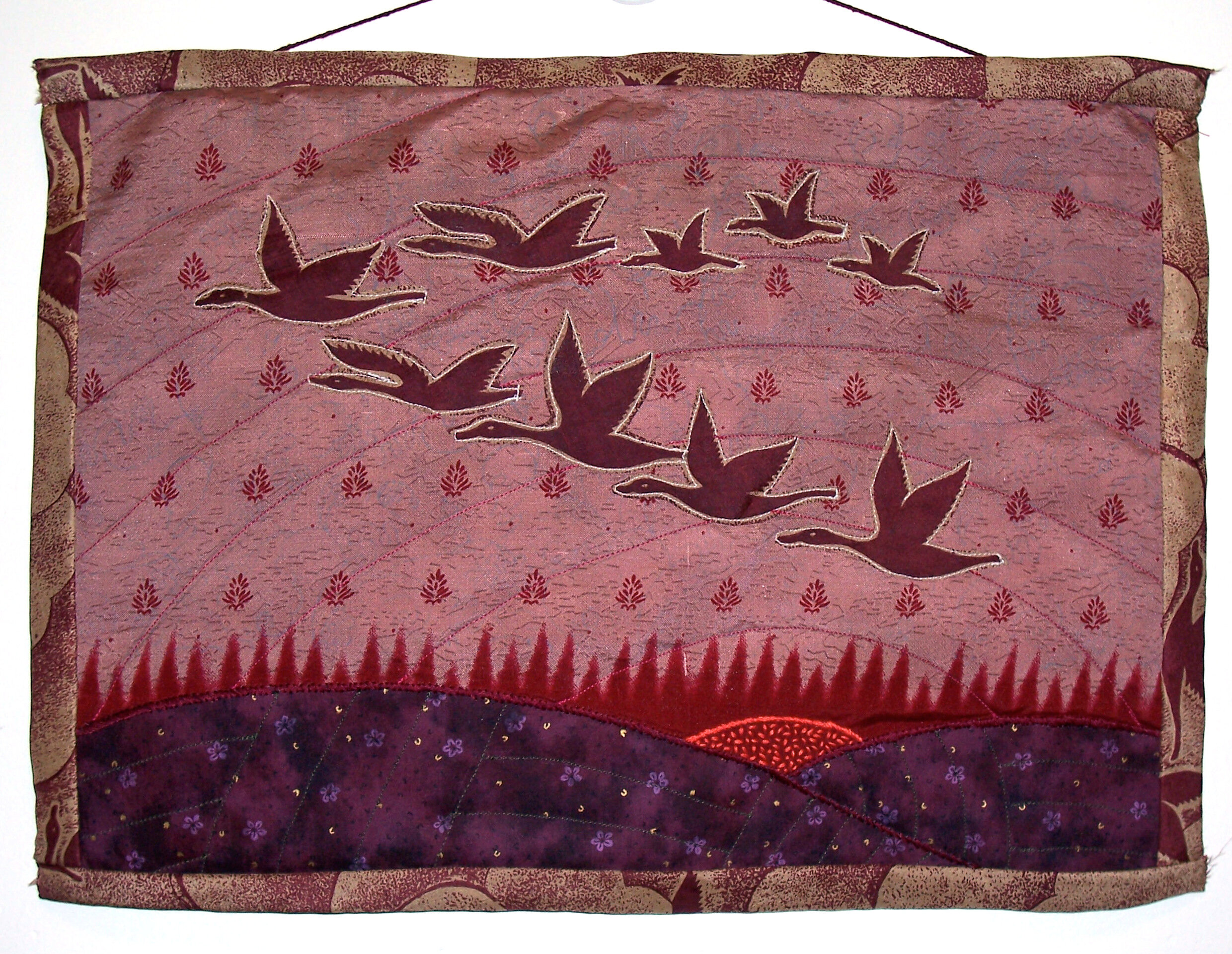  In Flight  Silk and cotton fabric, hand embroidery, and machine sewing 
