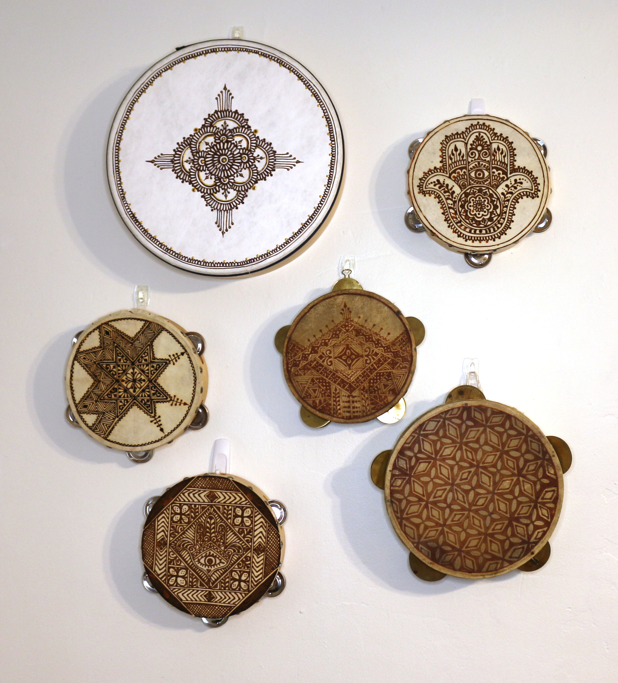  Henna on animal skin drums and tambourines 