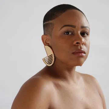 Taja modeling her “Ninety” earrings.