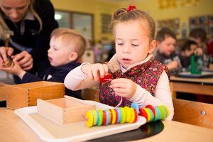 Girl Child Performing Activity - Pre Kindergarten