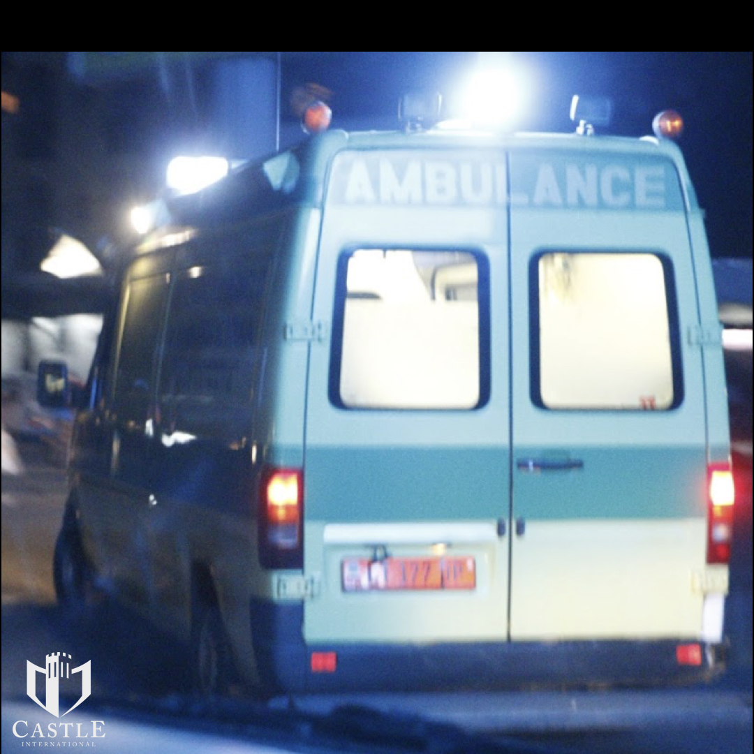 The ambulance we secured for the transport races us to the hospital in the middle of the night. 