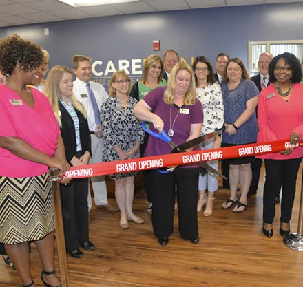 CARE Ribbon Cutting web.jpg