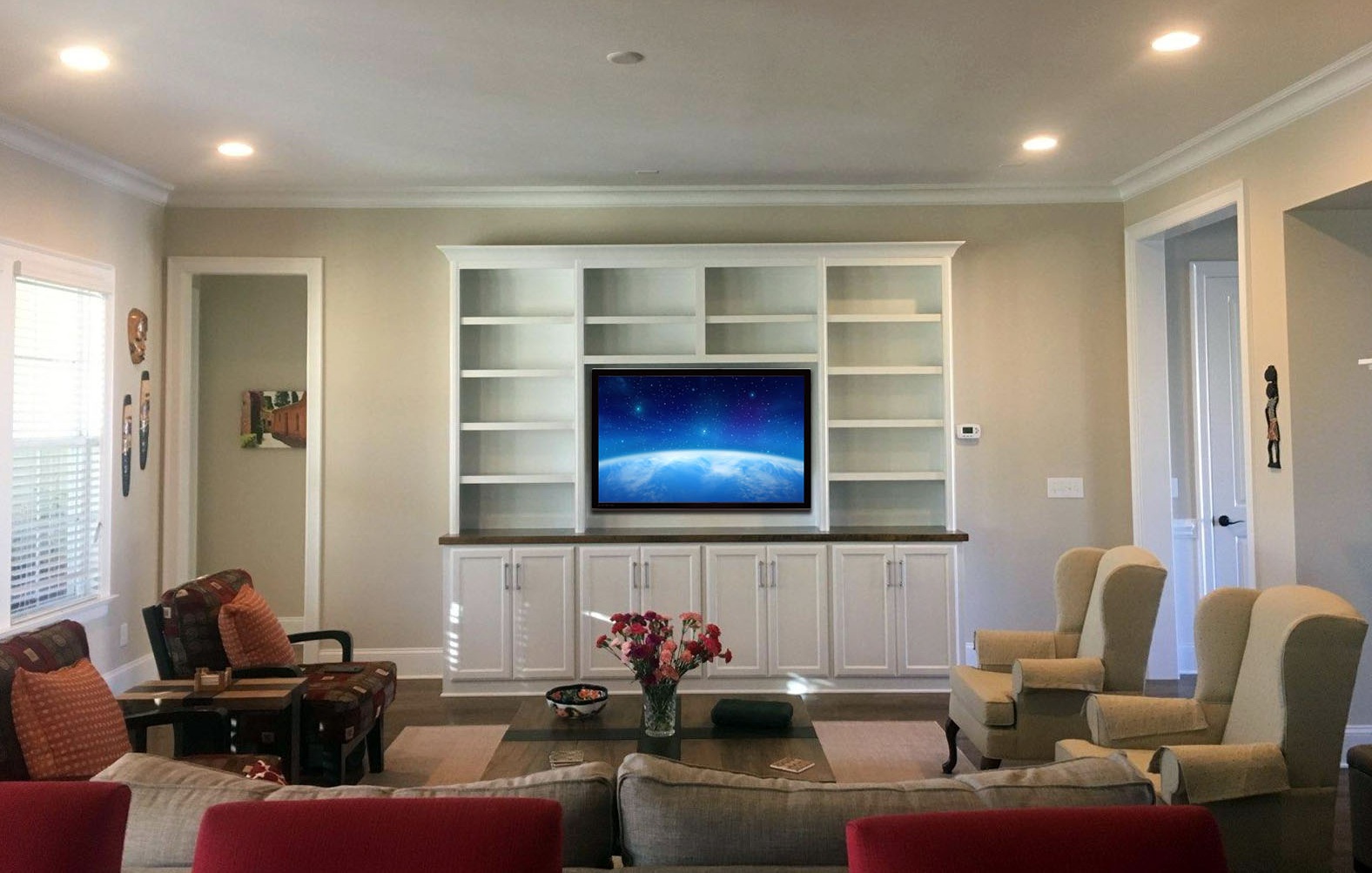 Built-In with Adjustable Shelves, TV Opening, Shaker Doors, Stain Countertop, and Crown Detail