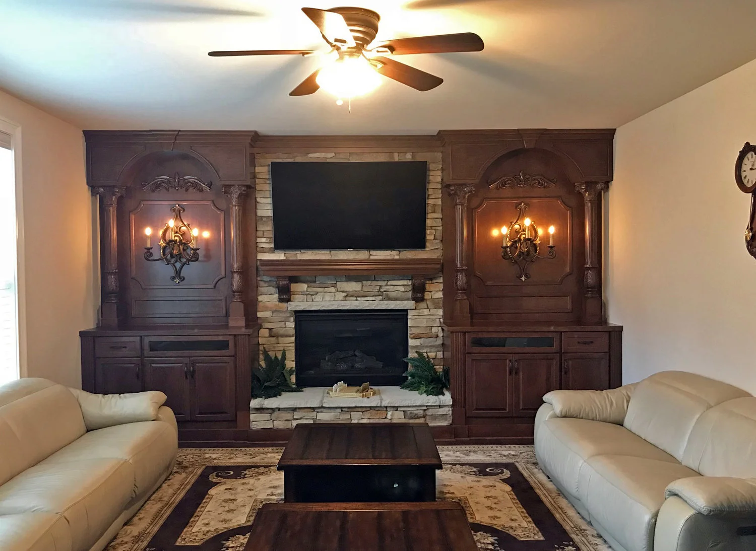 Fireplace Built-Ins with Shaker Doors, Custom Molding Details and Columns, and Arches
