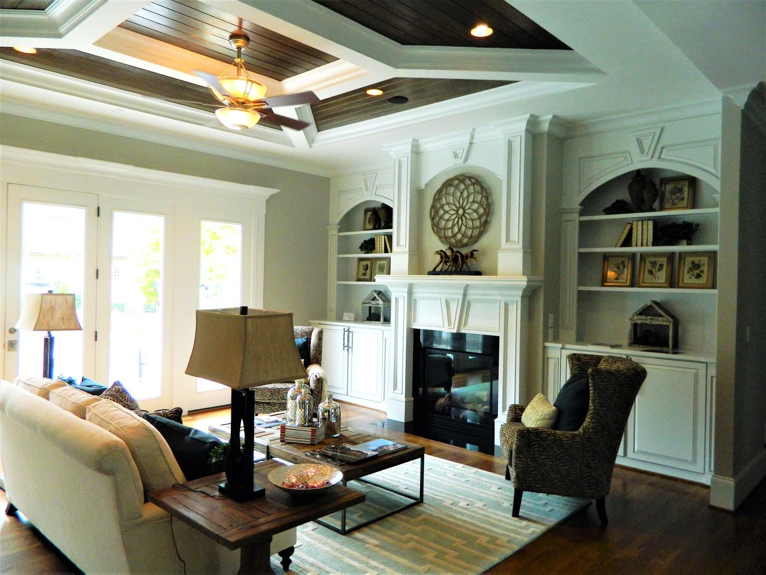 Fireplace Built-In with Adjustable Shelves, Raised Panel Doors, Applied Panel Detail, Keystone, Columns, and Crown