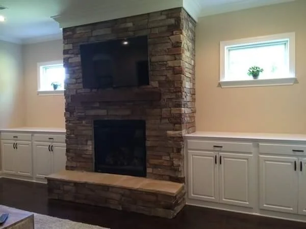 Fireplace Built-Ins with Raised Panel Doors, Slab Drawers, and Countertops