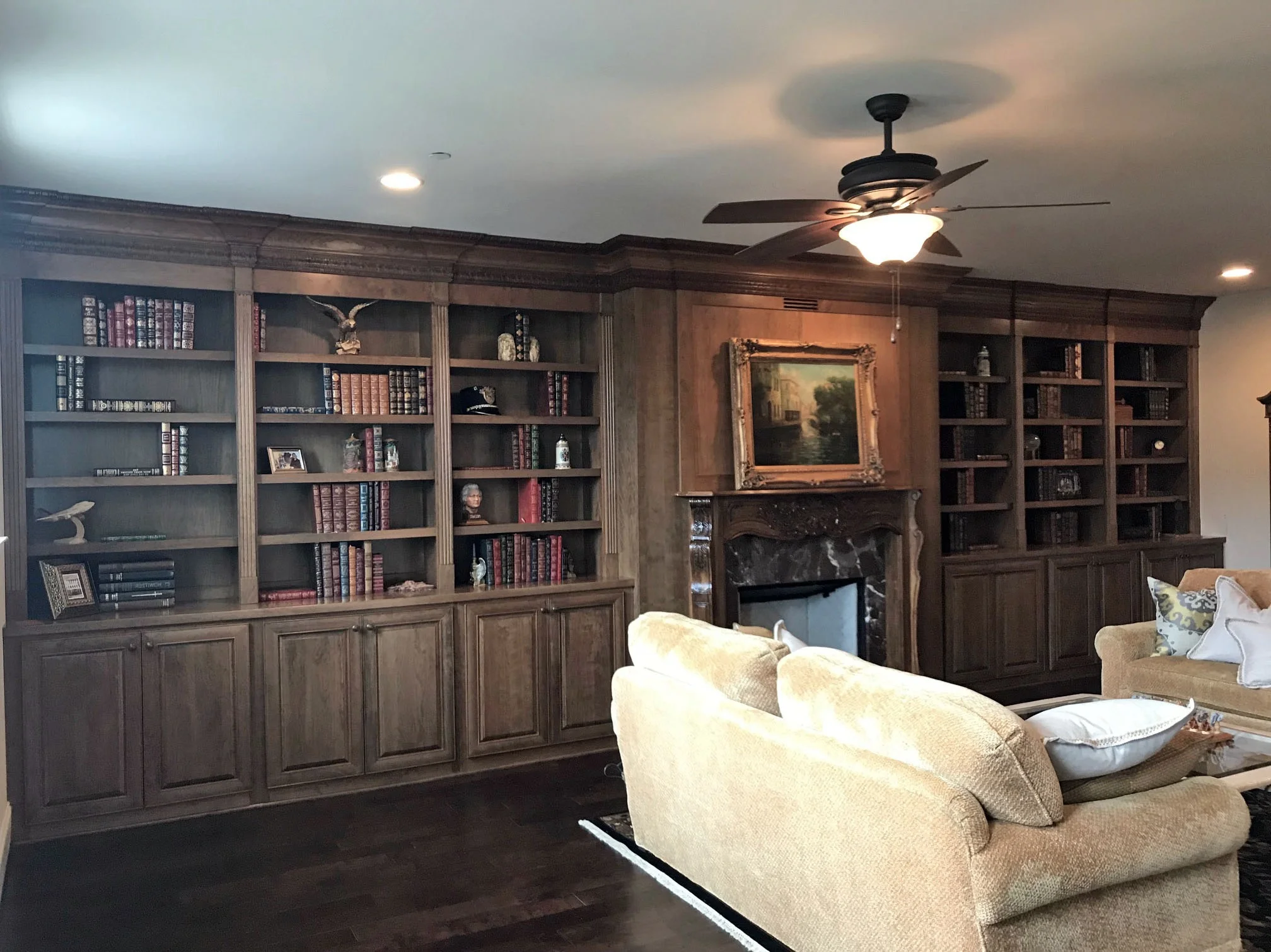 Fireplace Built-Ins with Adjustable Shelves, Raised Panel Doors, Fluting & Column Detail, and Custom Crown