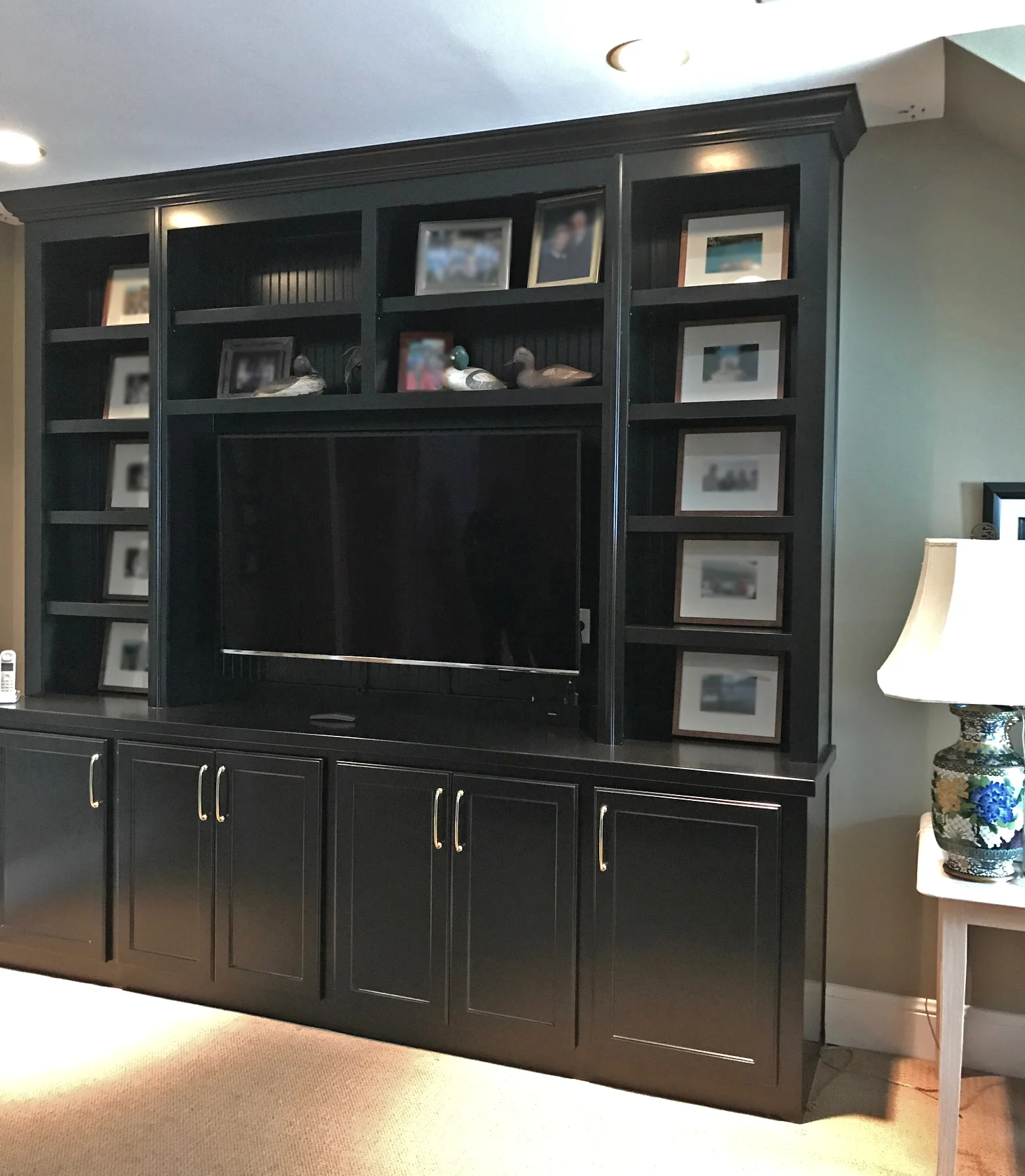 Built-In with Beadboard Packer, Shaker Doors, Adjustable Shelves, and Crown