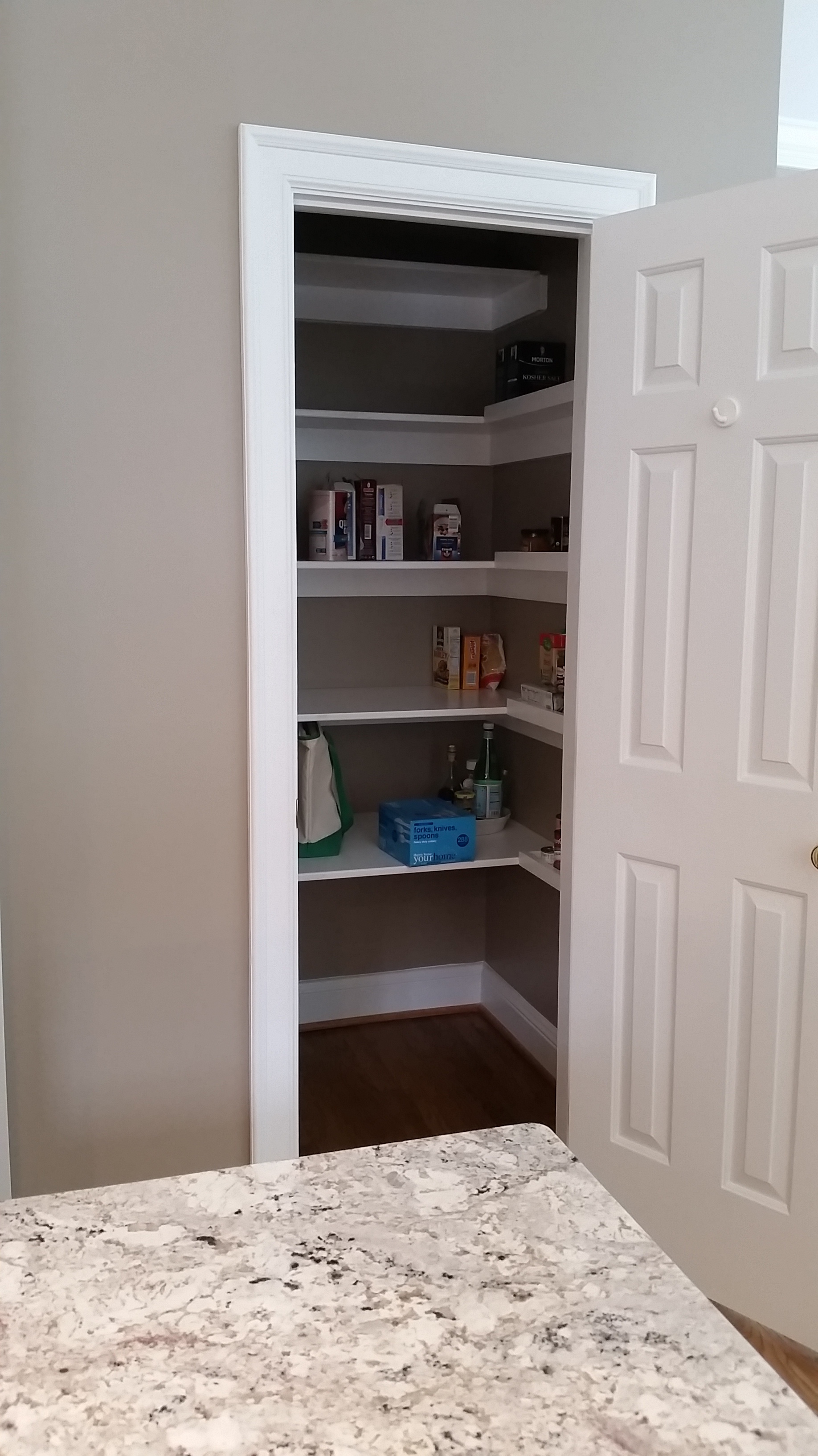Custom U-Shaped Reach in Pantry with Cleated Shelves & Lip for Spices and Cans