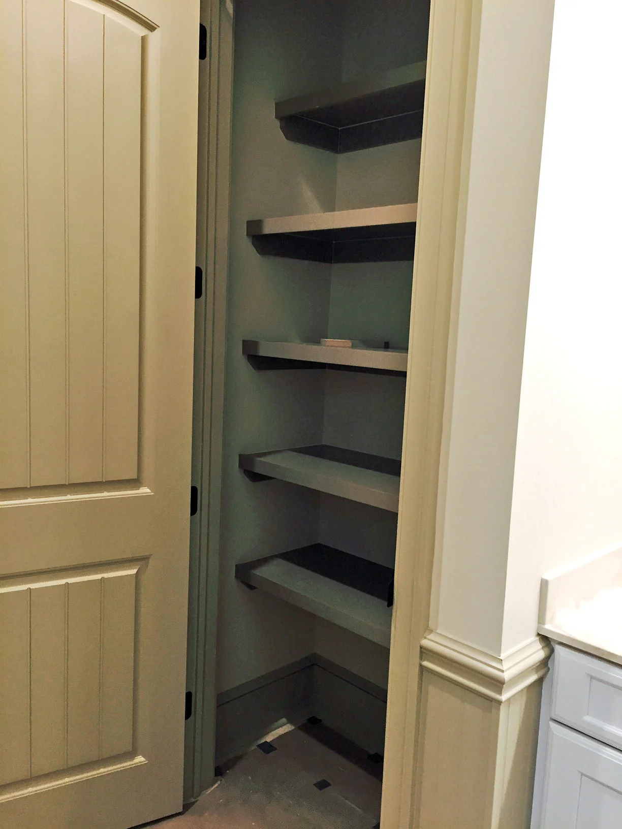 Custom Reach-In Pantry with Multiple Depth Cleated Shelves