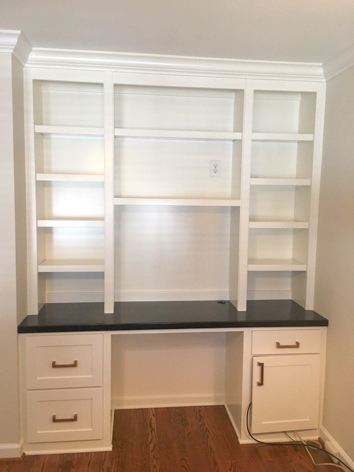 Built in desk and storage outlet