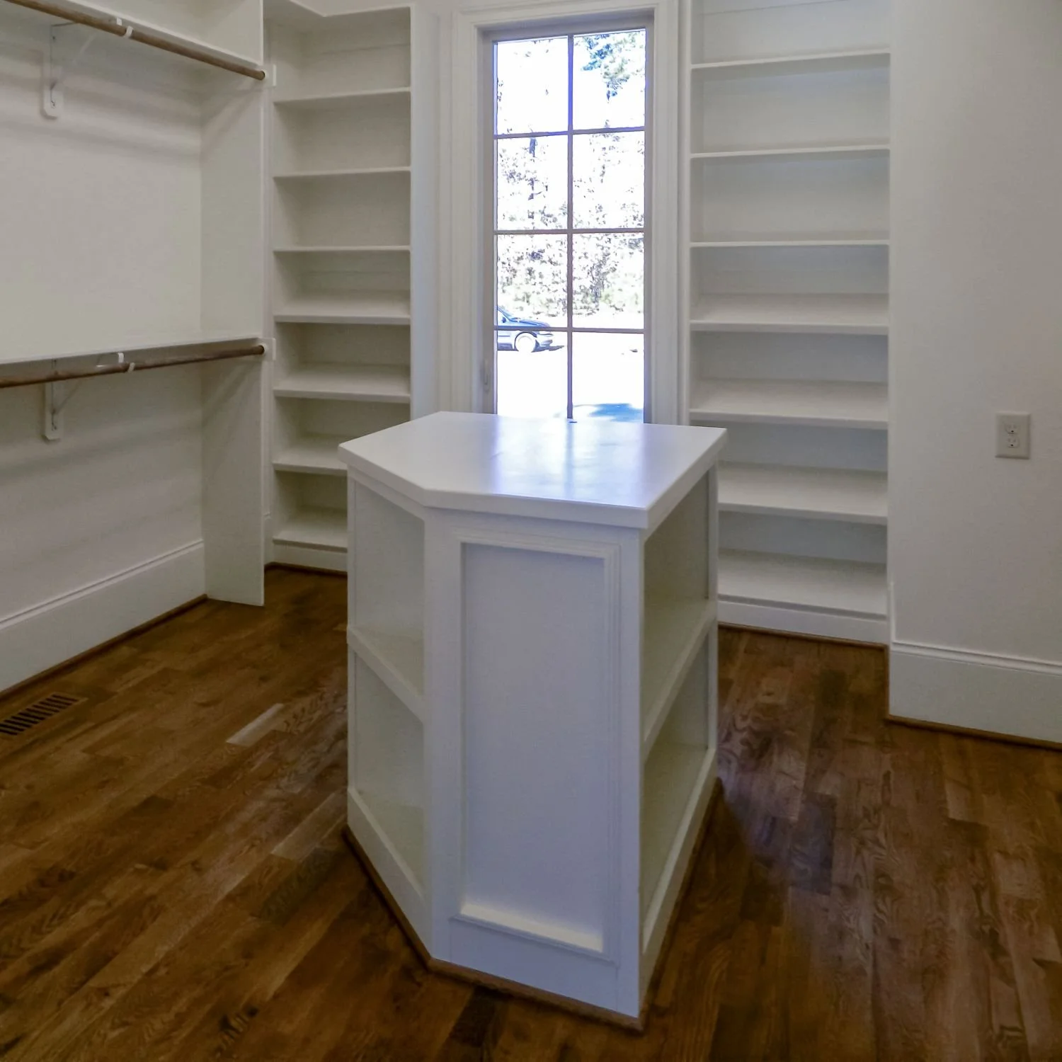 Unique Paint Closet Island with Shelving