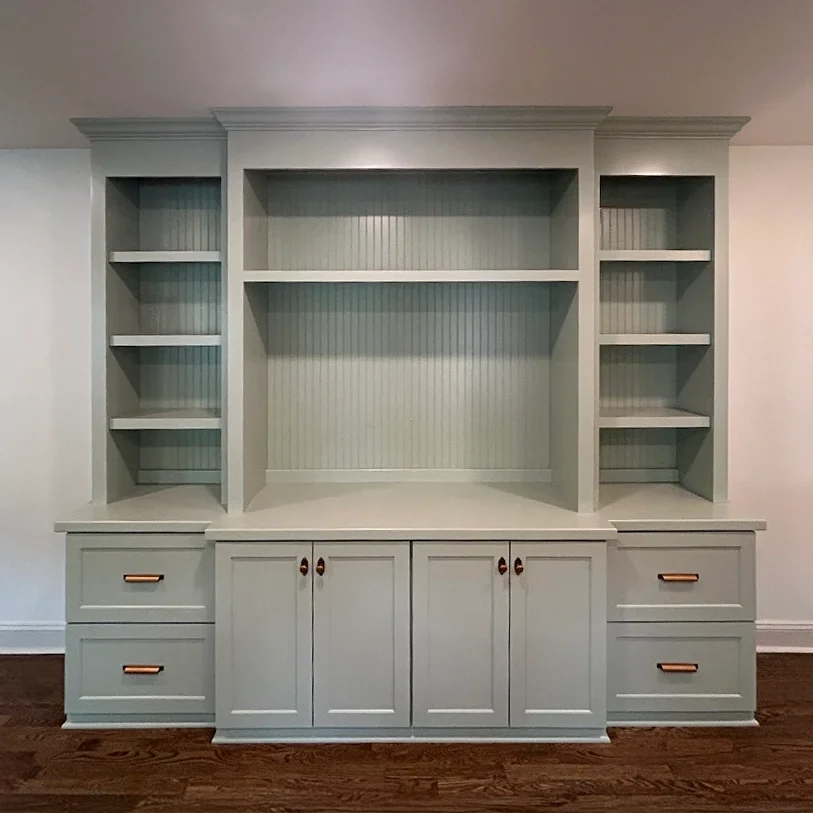 Custom entertainment center built-in with beadboard backer