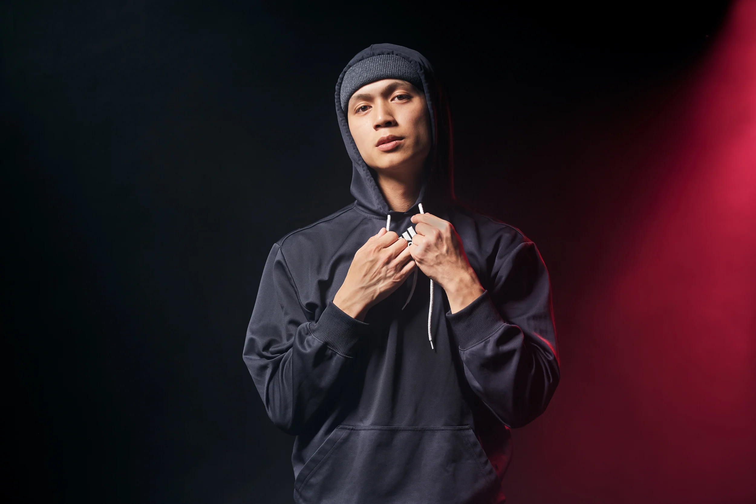  break dancer wearing adidas hoodie 