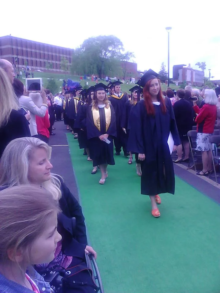 I snapped a flick while Caitlin was walking down the hill as student speaker for LMC graduation 2013 =)