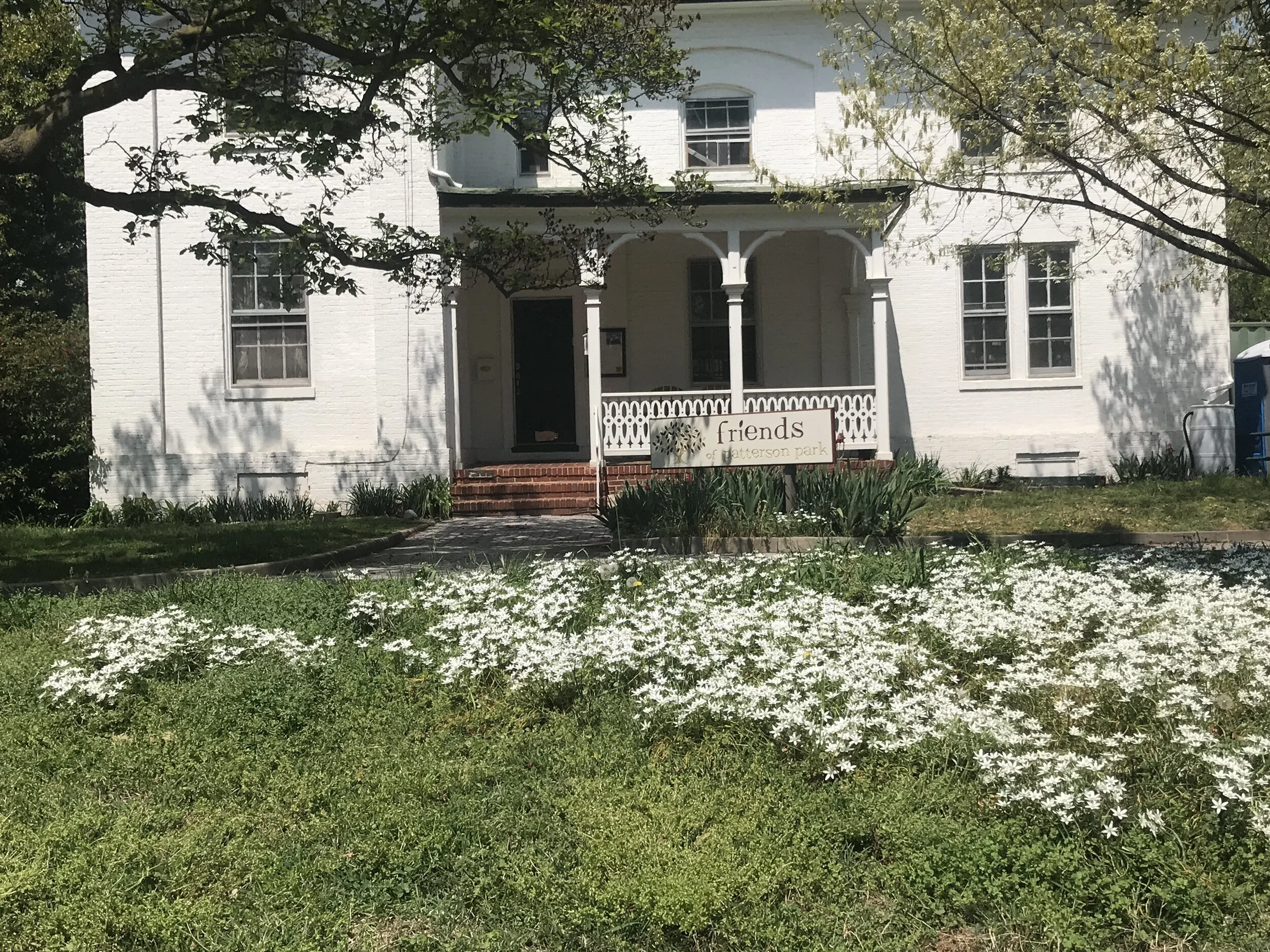 white house with flowers.JPG