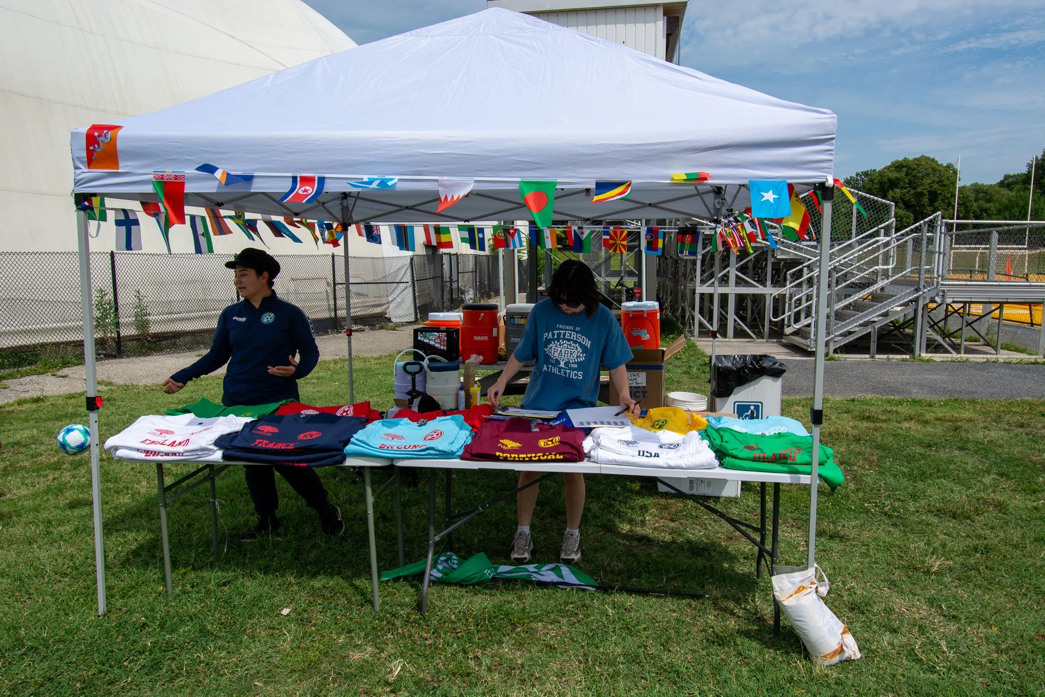  World Cup T-shirts displaying different country colors and names for each team 
