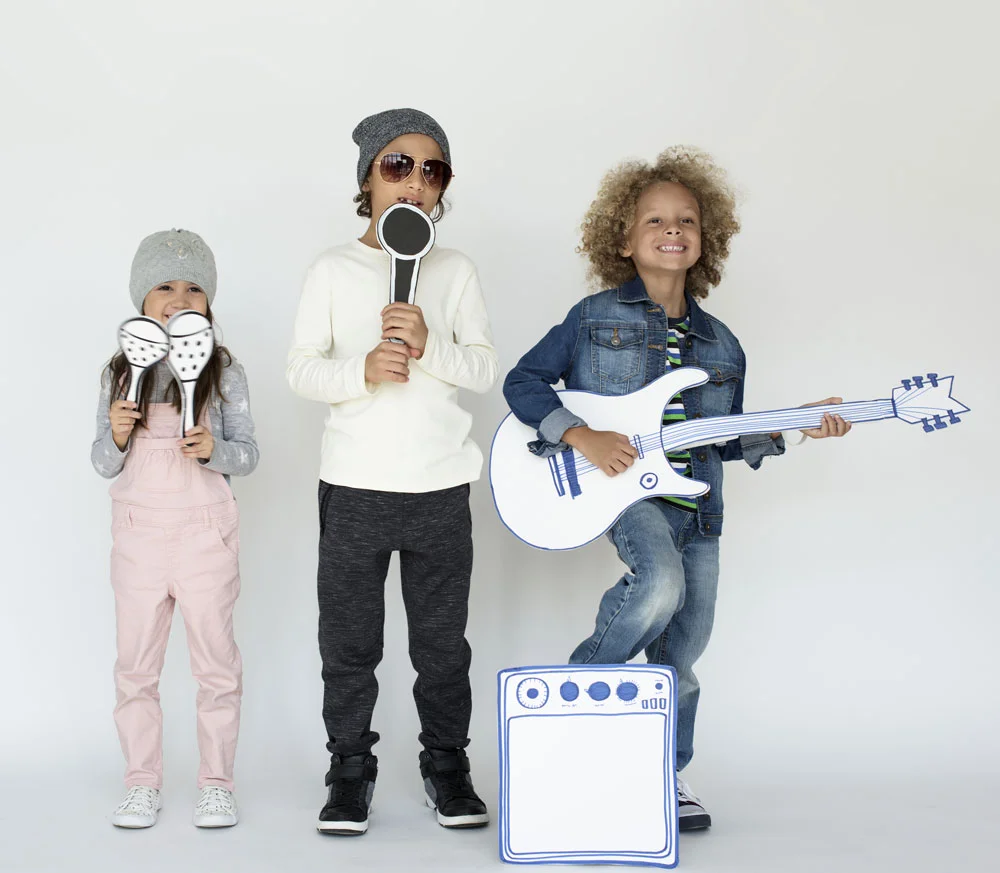 Making music doesn’t have to mean buying an expensive instrument. Instead, kids can get inspired by creating their own musical instruments and activities out of household items. The following are just a few of our favorite musical crafts for kids. 1. Tin Can Drums Drums are one of the easiest – and most fun – instruments for kids to make. Coffee canisters, formula tins, or old paint cans can all be used to create drums. Wooden spoons, sticks, and even little hands can be used for drum sticks! For added fun, cover the cans with masking tape and let kids color or paint their own unique designs. 2. Ghungroo Ankle Bells Learn more about another culture by creating Indian style Ghungroo ankle bells . Ankle bells are an important part of traditional Indian dancing; while known as ghungroo in North India, these ankle bells are also called salangai or chilanka in other parts of the country. Attach small jingle bells to a piece of yard or small strip of felt around the ankles and enjoy! 3. PVC Pipe Xylophone While this project takes some space, time, and construction skills to create, it will result in a fun musical instrument that can be used for years to come! Begin by calculating the length of your pipe. If you want to create specific notes, the PVC pipe will need to be cut at exact lengths . After being cut, the pipes can be attached to the wood frame using simple plumbing brackets. Finish the xylophone by putting different color tape or paint on each pipe to differentiate between notes! 4. Egg shakers With plastic eggs still on sale at many stores, now is the perfect time of year to create egg shakers. Rice, dried beans, small candies, cereal, beads, and more can all be used to create different sounds in different eggs. Let kids experiment with different materials and combinations to create unique shakers and sounds, and seal the plastic eggs with glue to prevent them from breaking apart during play. For added fun, put the eggs between two plastic spoons and cover in washi tape to create maracas . 5. Tissue Box Guitar An empty tissue box, a paper towel tube, and a handful of rubber bands are all that is needed to create this guitar . Cut a hole in the top of the tissue box before inserting the paper towel tube, sealing the joint with tape. Next, add the strings by stretching the rubber bands around the length of the tissue box. Finally, decorate with paint or sticks and enjoy!