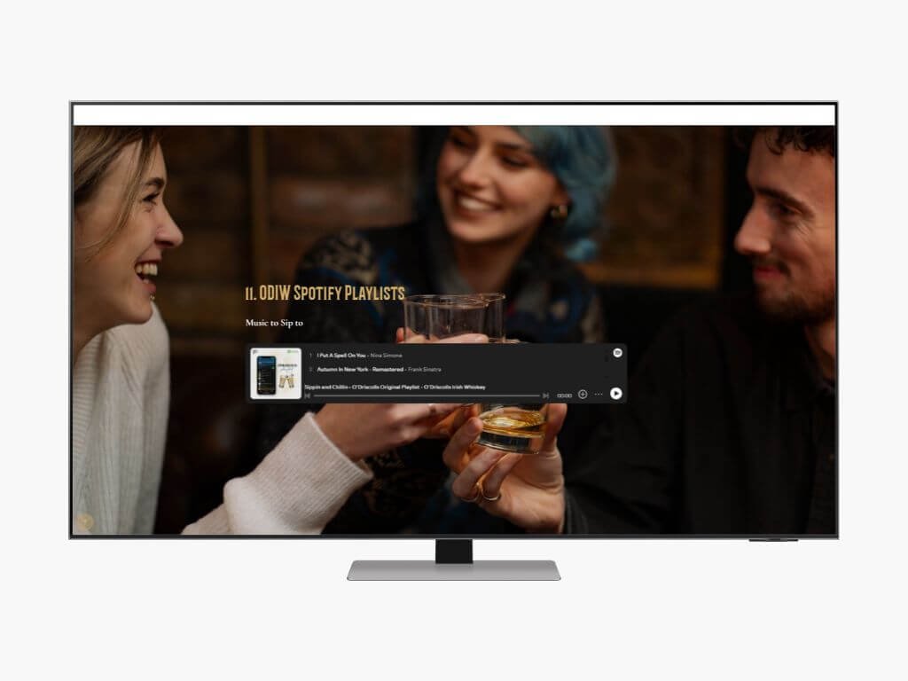 A television screen displaying a group of three friends toasting with drinks, with music playlist details overlaid.