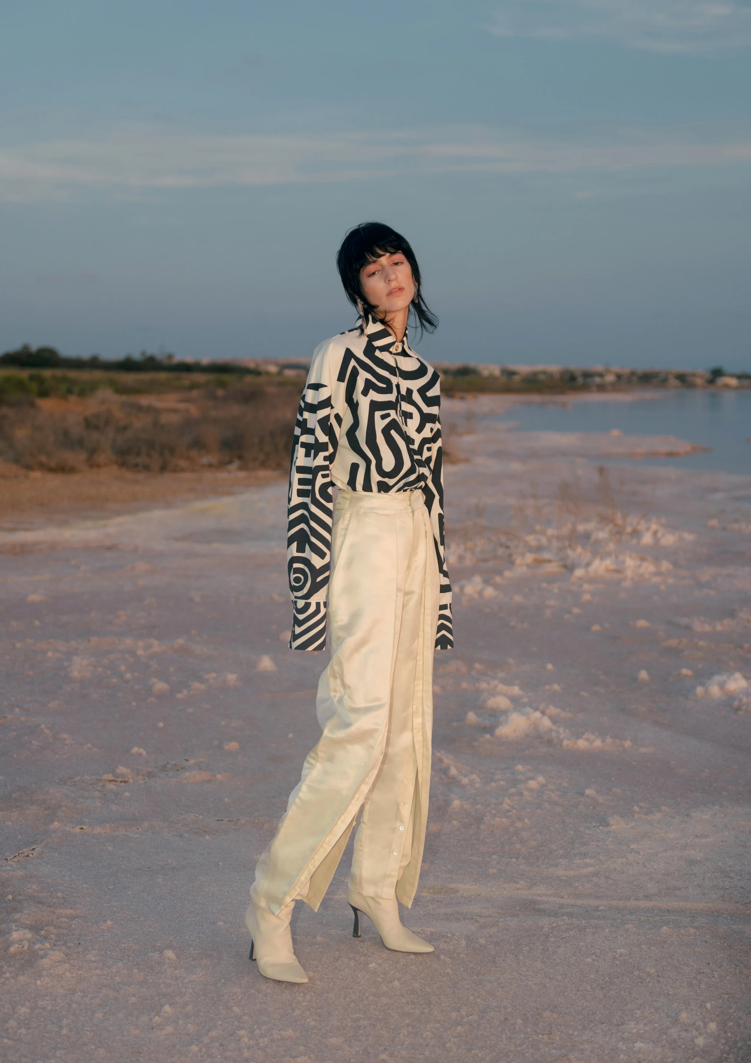 Earrings BIIS Shirt A.W.A.K.E. Trousers DANIELA HARSH Shoes WANDLER