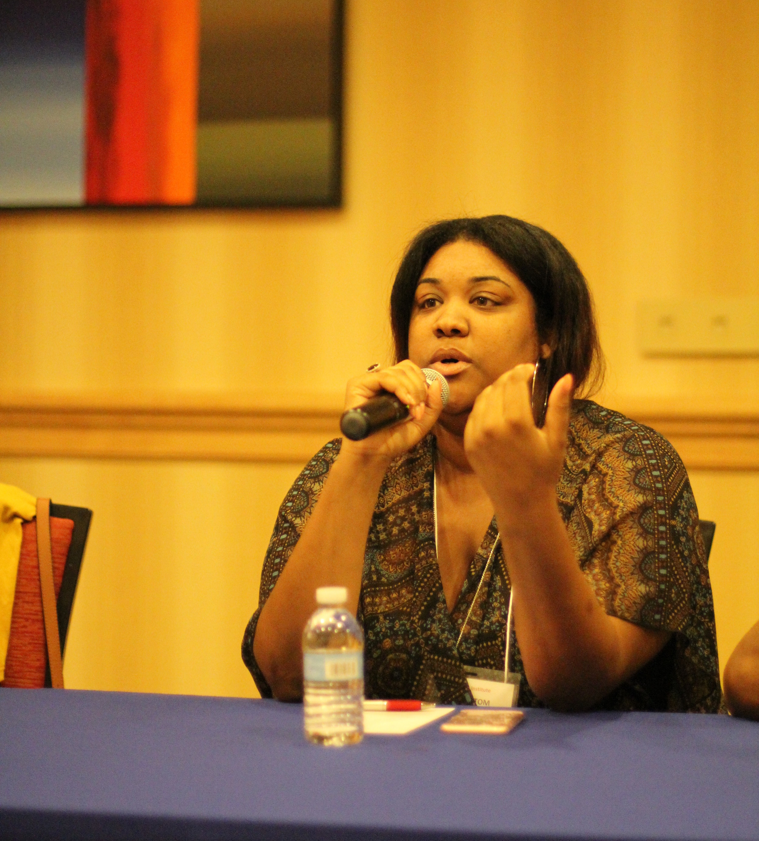 Arnice speaking to younger SEED graduates about her college experience at the annual SEED Graduate Institute.