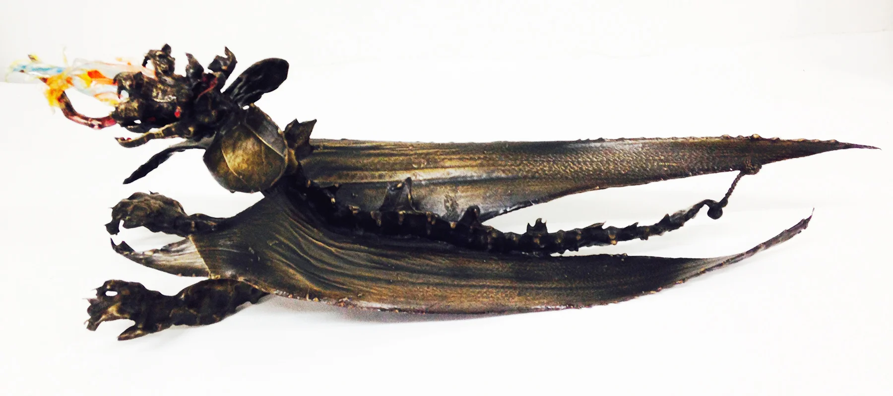  "Big Flame Dragon" (Other view) Free standing Bronze sculpture with mixed media. H 6.5" x W 5.5" x L 18" $6,000.00