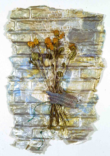 "Bouquet" cast junkmail, glove & dried roses, approx 36x 22"