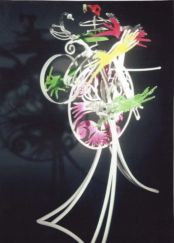 “Too Many Horses on the Track”, 5.5 ‘ H x 5’ D x 30 “ W, Painted Steel