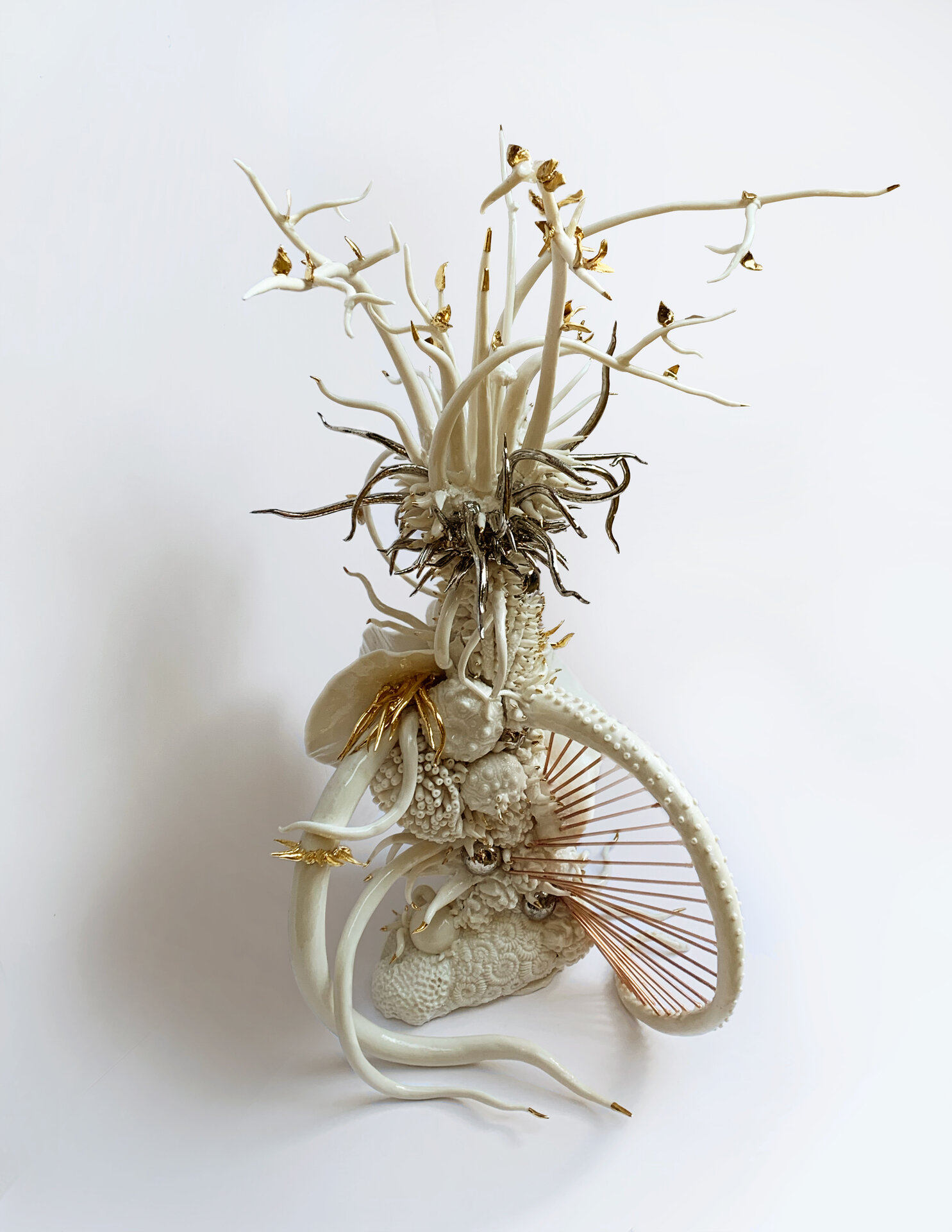   Saba Besier  “Intrepid Growth” 22.5” x 12” x 12”; Porcelain, gold, white gold and copper $3600. 