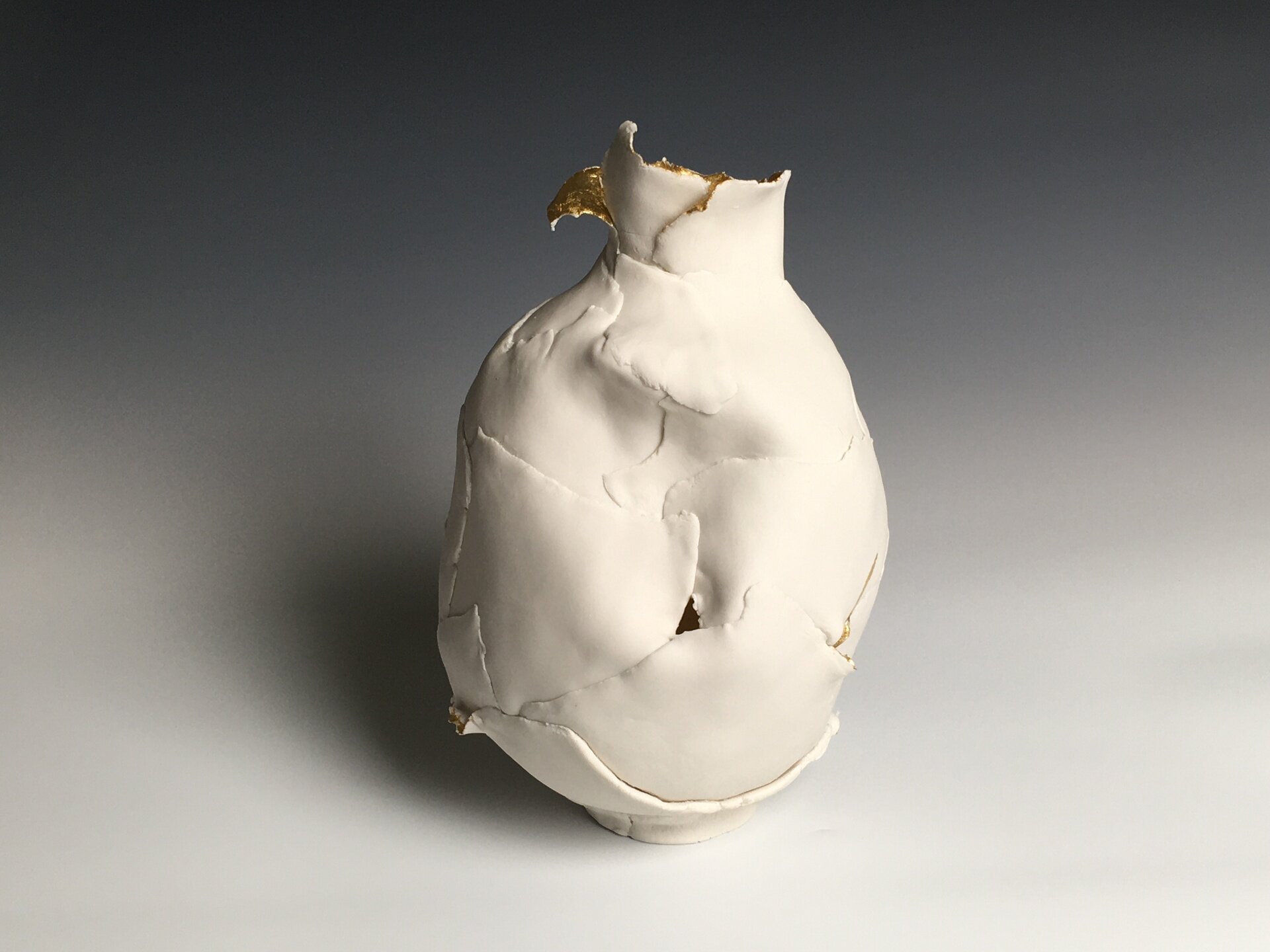   Deneece Harrell   Ham  “Quiet Grace”  11" x 6" x 7”; Porcelain &amp; Gold leaf $950. 