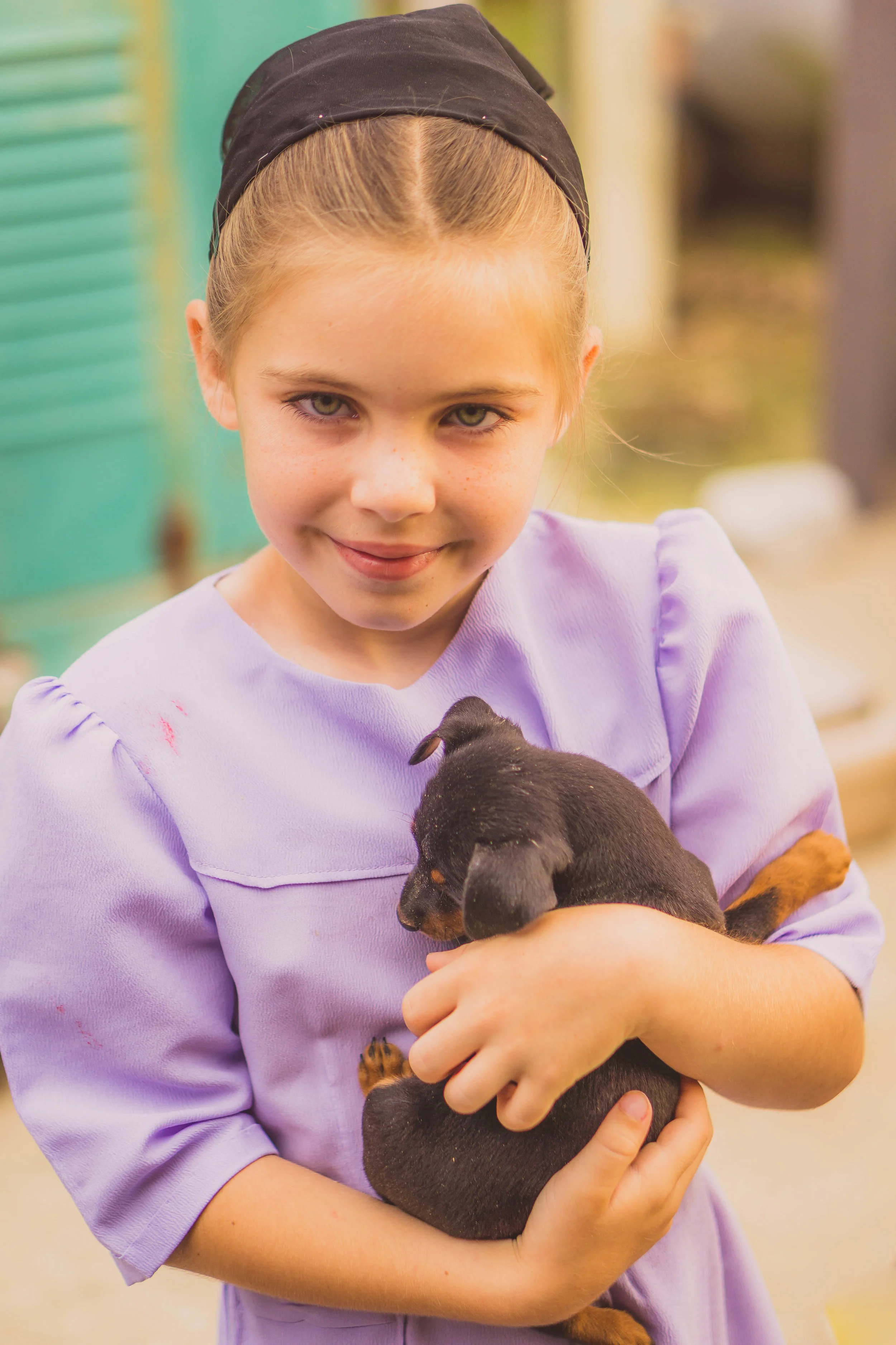Amish girl and puppy.jpg
