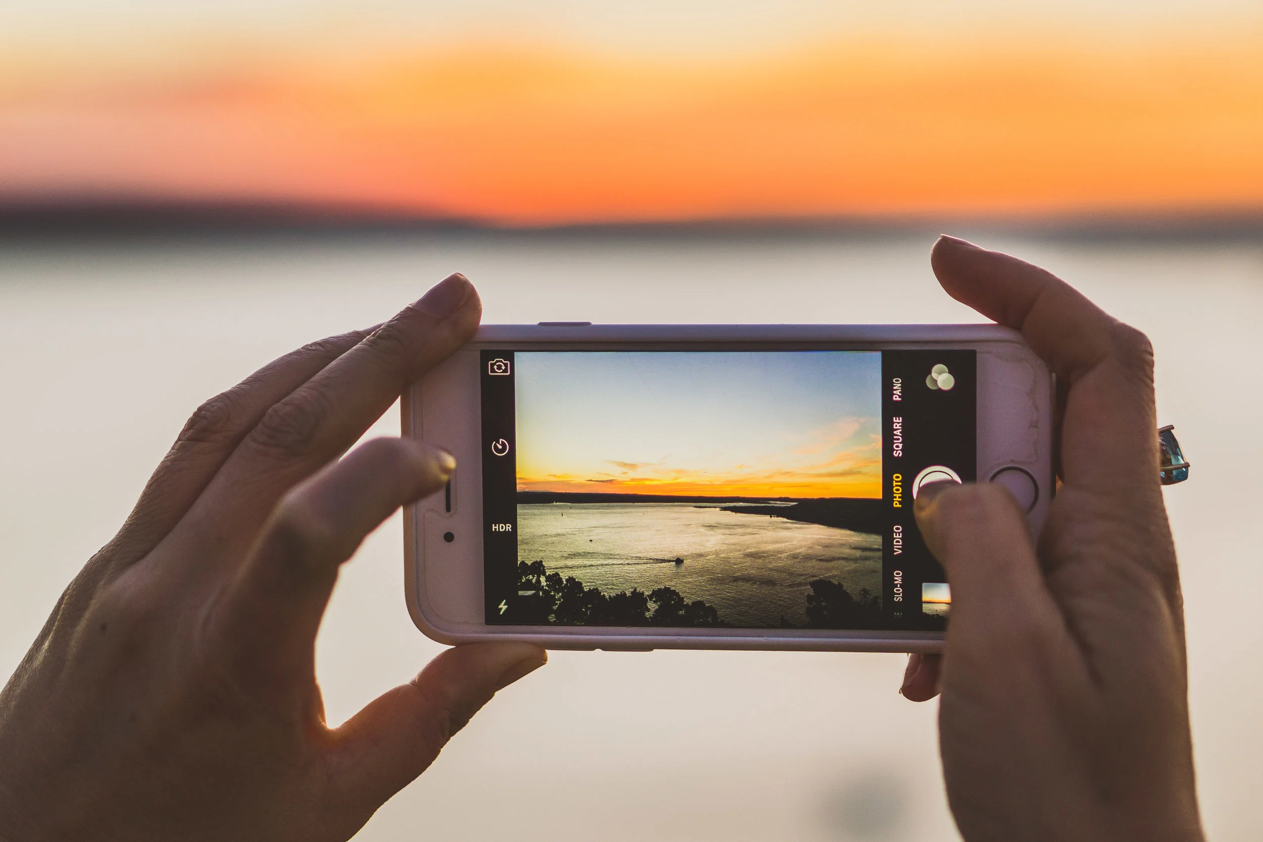 The view from The Oasis through one of the innumerable smartphones feebly attempting to capture the grand landscape.&nbsp;