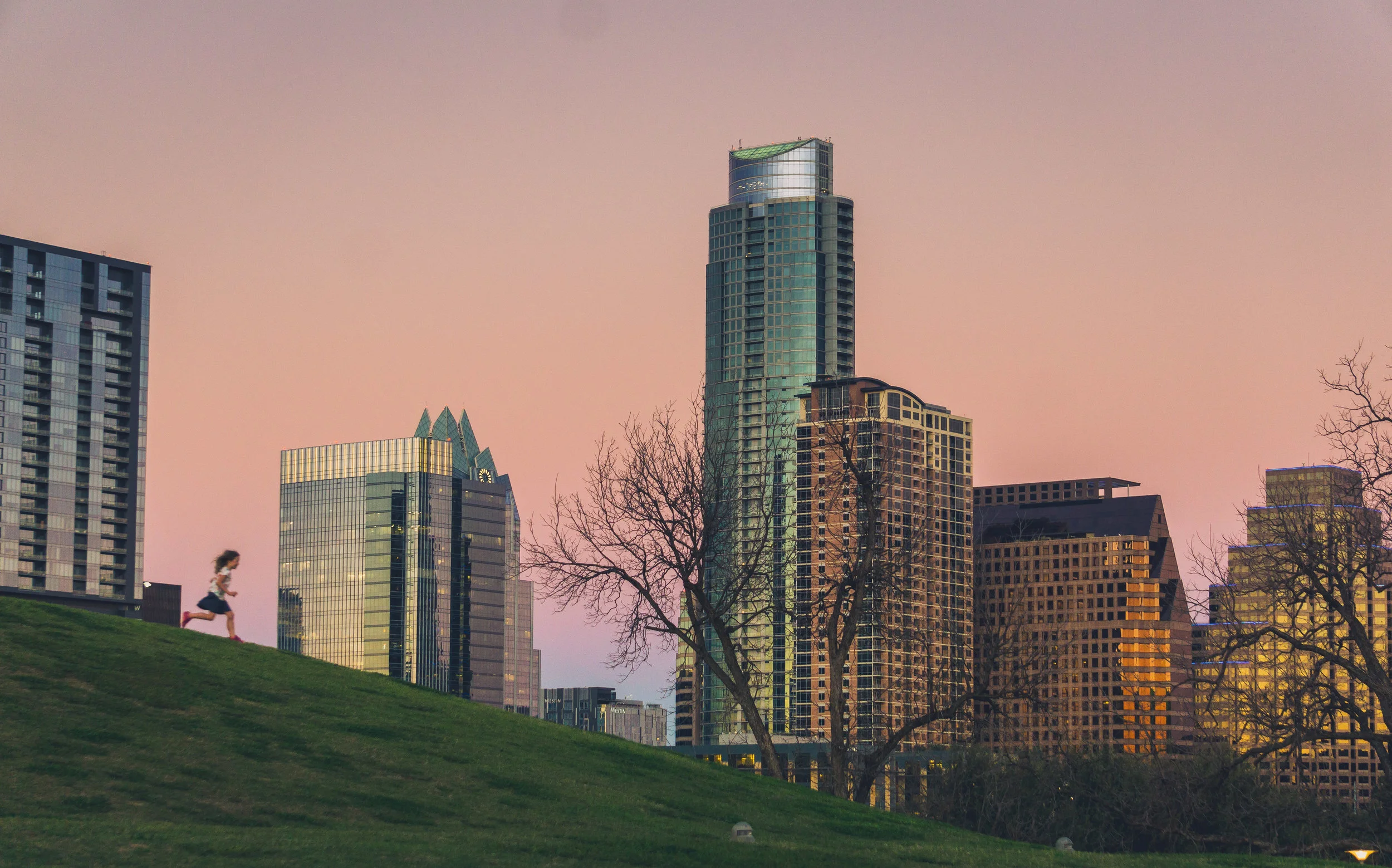 A delightful little girl speeds down the Doug Sahm Hill. Thought she might crash and burn for a bit, but she made it.&nbsp;