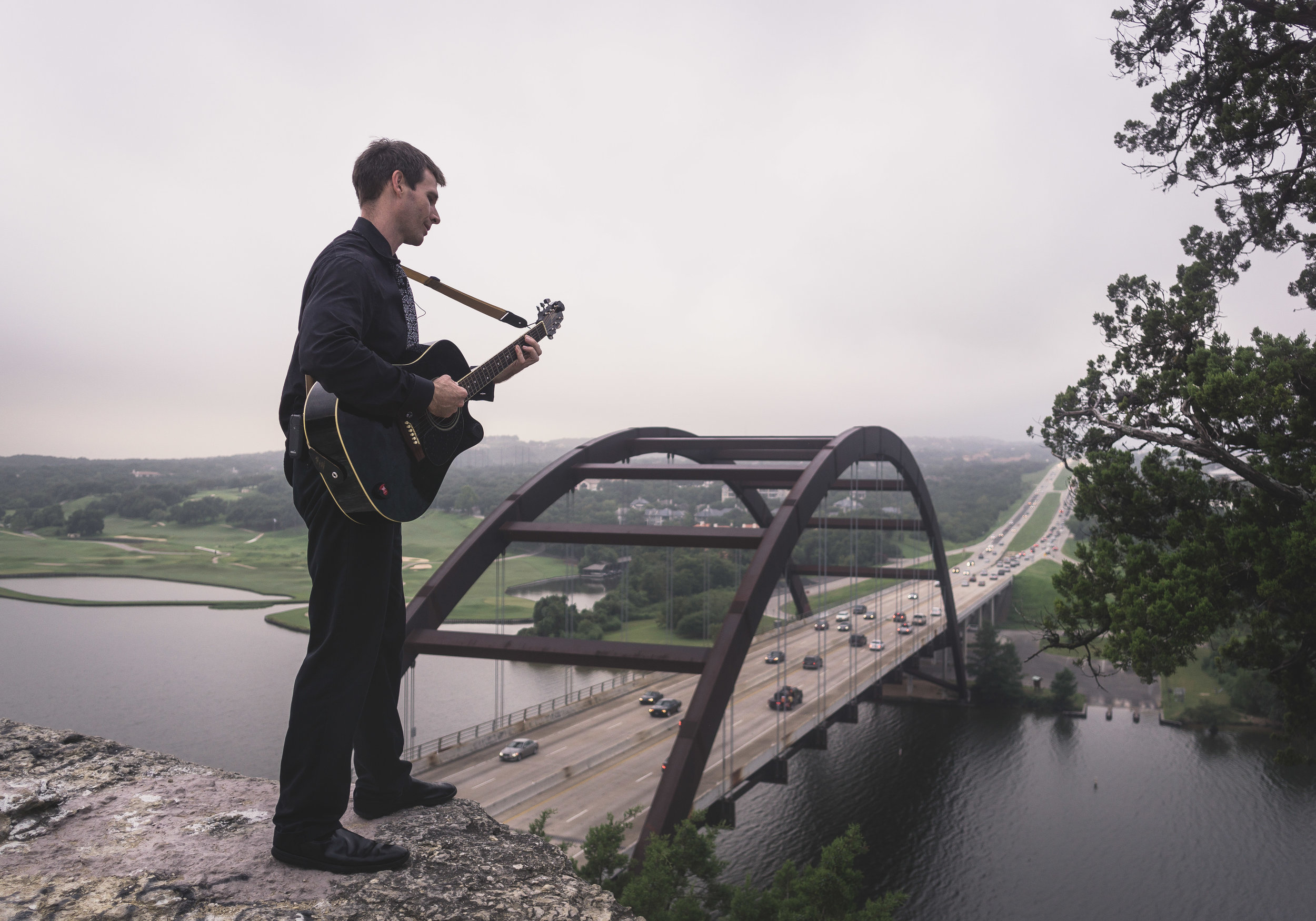 Ed Ruhnke playing guitar color.jpg