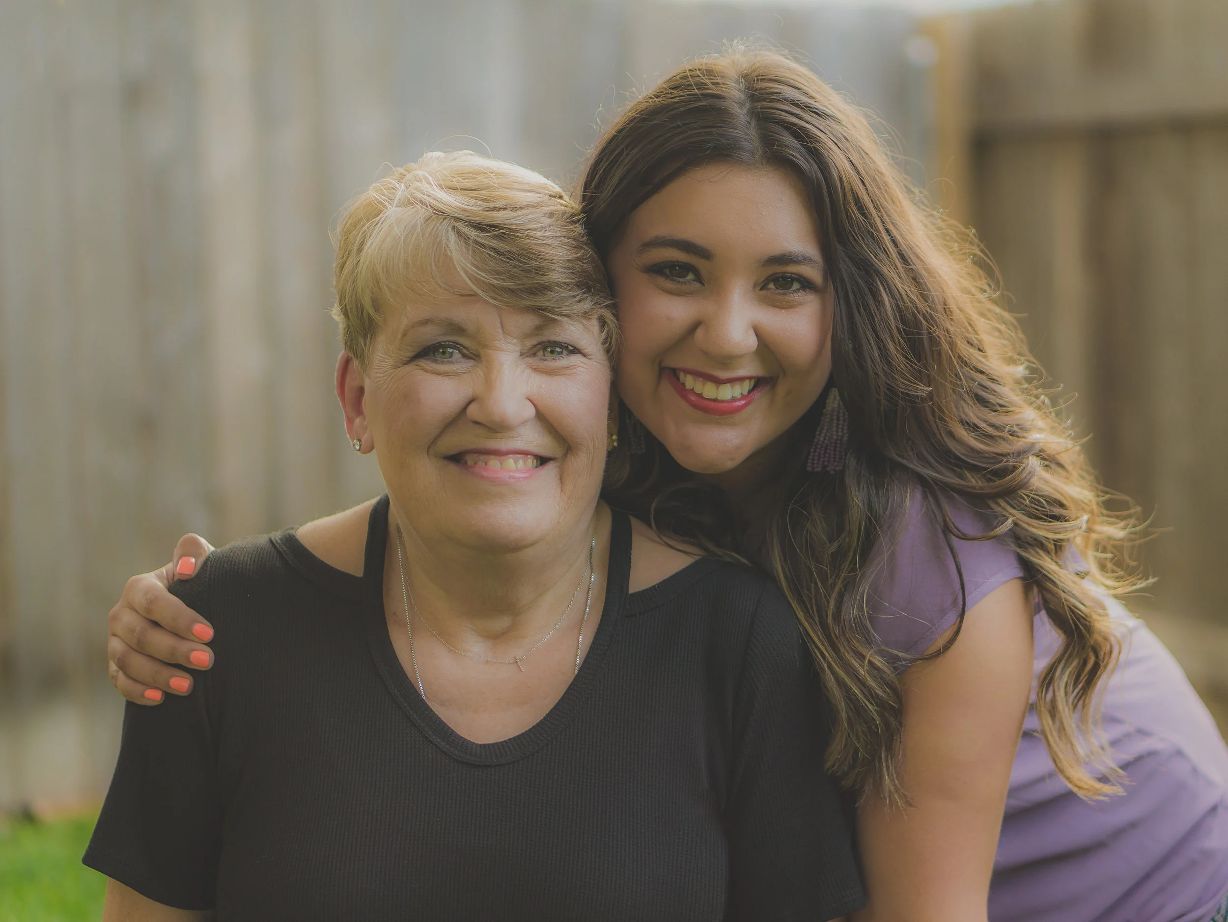 mama cruz and purple granddaughter.jpg