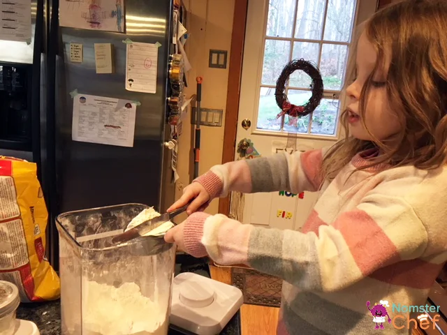 measuring flour - Cookie Jar Gift DIY for Kids .jpg