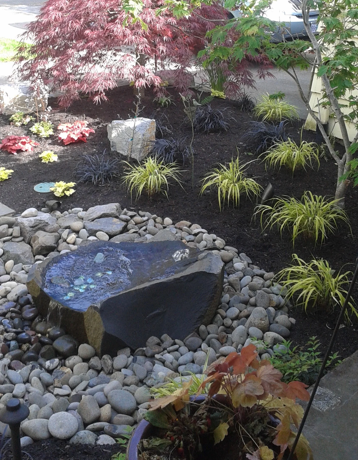Portland After II. A pondless water feature is added.