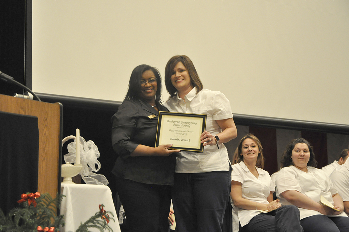 DSCC Nursing Instructor Trenna Richardson (left) presented the Peggy Pendergrast Faculty Award to nursing graduate Bonnie Carmack (right) of Gates.