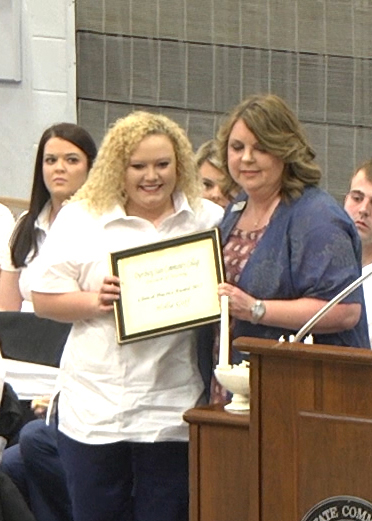 Nursing graduate Hollie Goff (left) of Dyersburg was presented the Clinical Practice Award by nursing instructor Tammy Hines (right) during DSCC’s nursing pinning ceremony May 6.