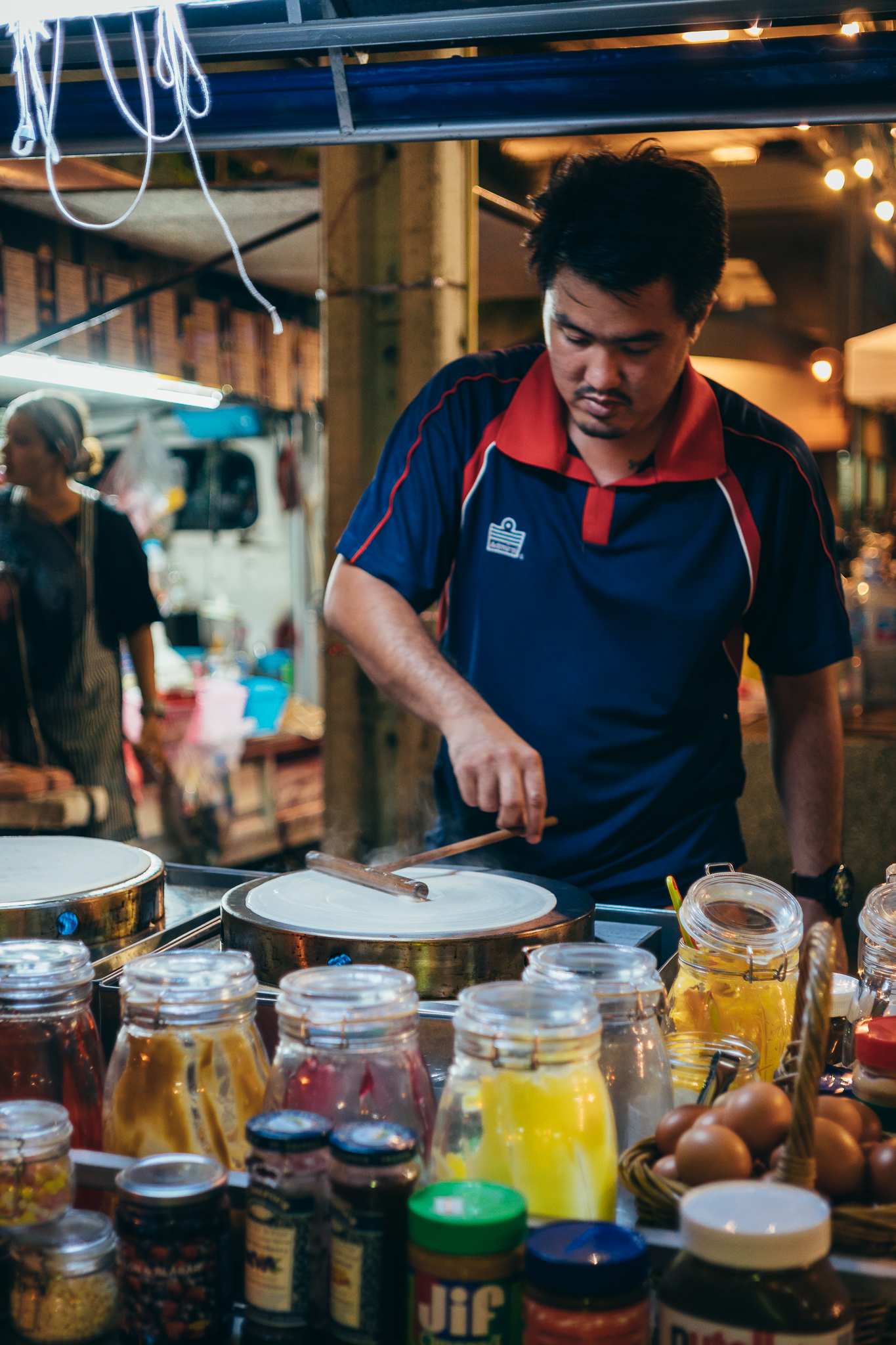 Jay makes the best Crispy Crepes in Bangkok! You can find his stand at Bangkok Bazaar, close to the Saphan Taksin BTS station