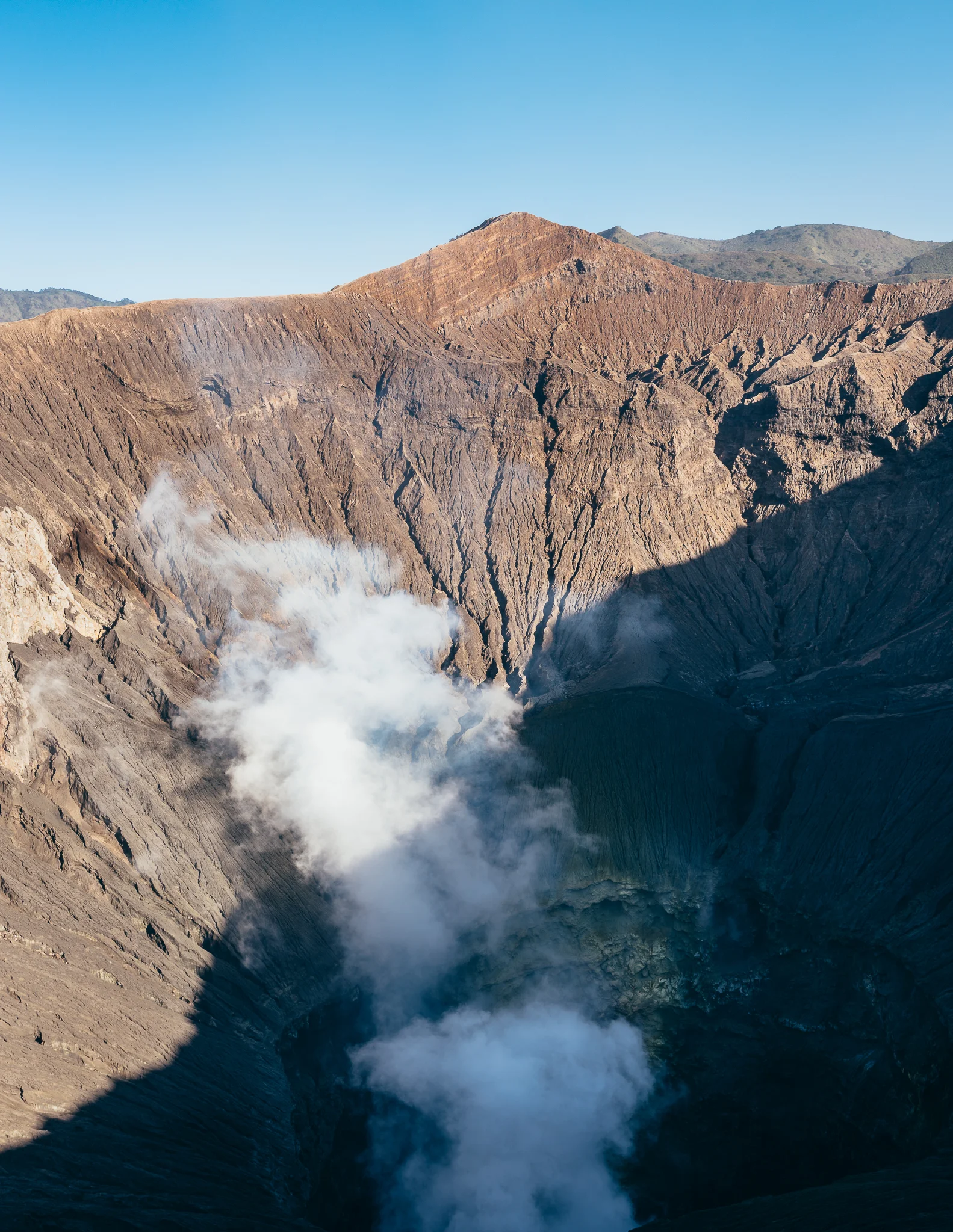Smoke coming out of the crater.