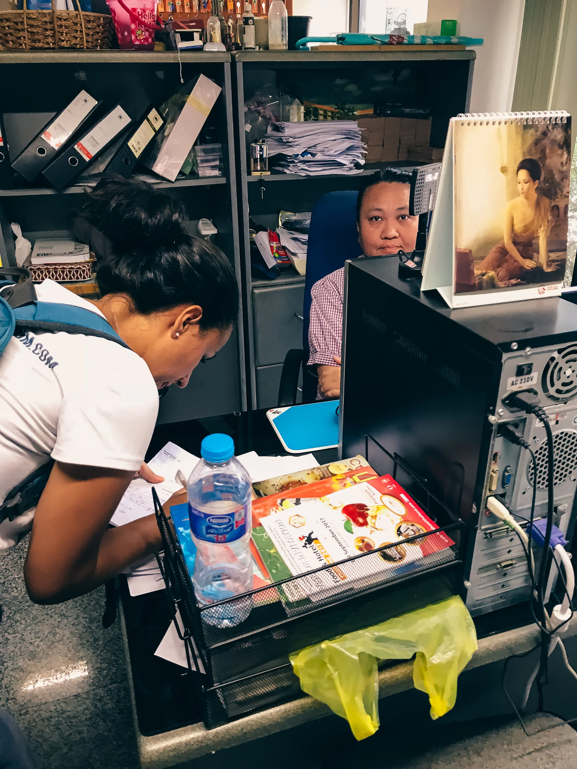 Finding an apartment in Chiang Mai is so easy! This is me signing a two-month lease with the landlord.