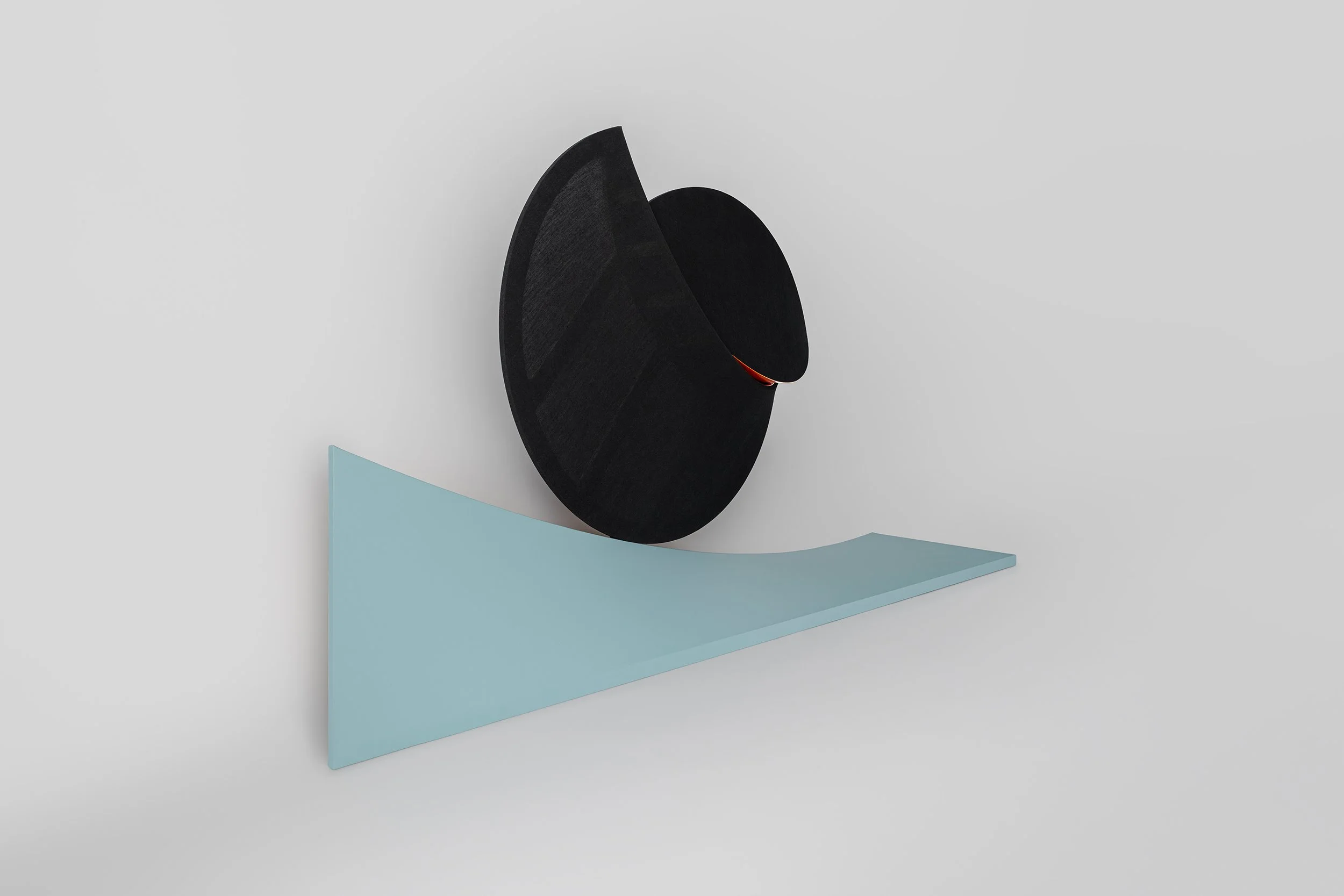   Concept Description      DYNAMICAL COUNTERPOINT III  holds implied motion in equilibrium, composing a  spatial counterpoint  in which a bisected circular form appears to roll across a twisted plane, its trajectory arrested at a single point of cont