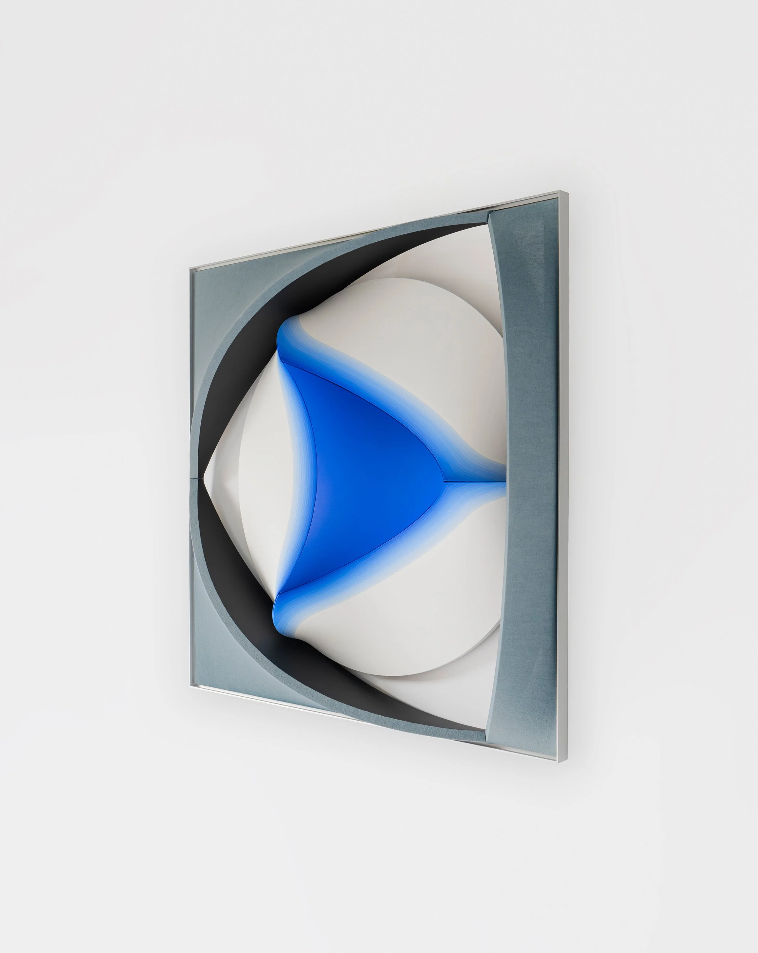   Concept Description    GEOMETRY OF RESTRAINT—Triangle inside Circle inside Reuleaux Triangle inside Square  treats restraint not as a mere limitation, but as an active spatial principle in which static balance carries an intimation of movement.  As