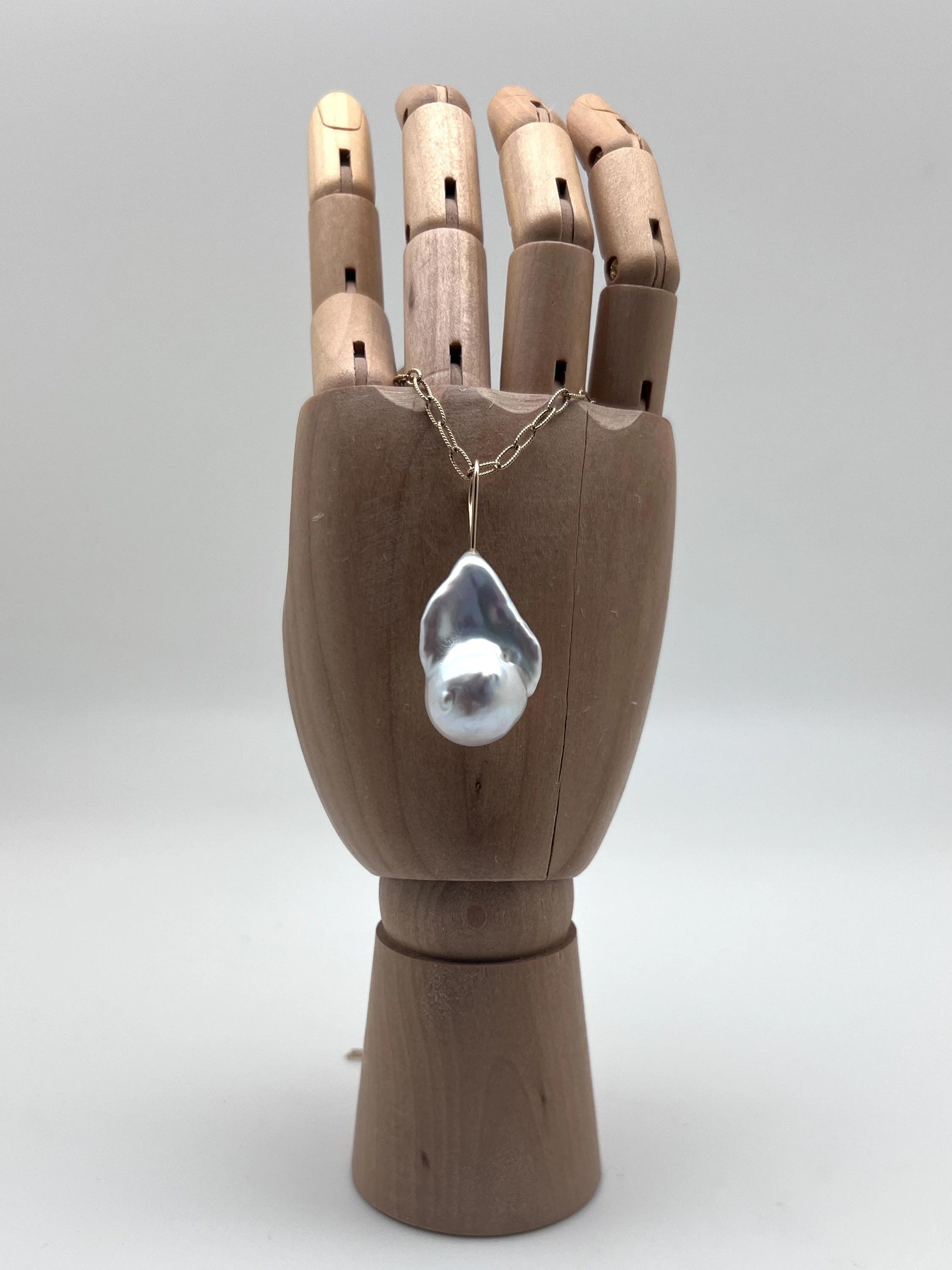 white flame pearl pendant