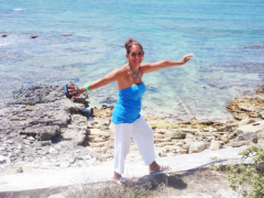 MOTHER WALKING ALONG THE EASTERN CARIBBEAN COAST IN THE GRAND TURK AND CAICOS ISLANDS, 2010.