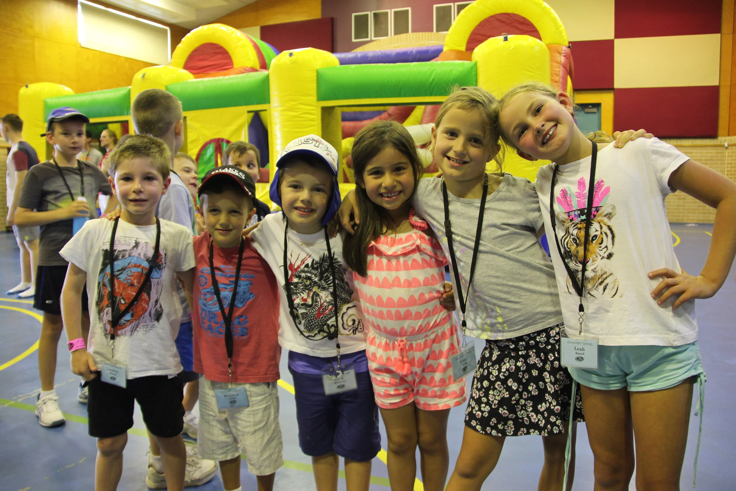 Kids in front of jumping castle.JPG